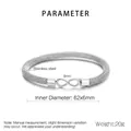 Macro detail of infinity charm on a woven stainless steel mesh bangle with dimensions - Infinity Style (Model B) / Steel