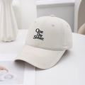 Close-up of One Day Sober black embroidery on high-density beige cotton baseball cap - Off White