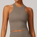 Seamless racerback yoga tank top in earthy taupe featuring a supportive ribbed hem - S / Brown