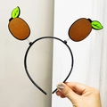 Cute kiwi fruit headband with brown felt slices and spring leaves for parties - Kiwi Fruit Hairband