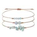 Juego de 3 pulseras de cuentas de piedra azul claro con detalles dorados y cordón crema - Amazonita