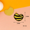 Detailed view of a 25mm heart-shaped bee alloy charm with dimensions and weight info - Style 7 Gold Heart Figure