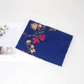Dark blue lightweight shawl with colorful floral embroidery in a flat lay presentation - 170x90cm / Royal Blue