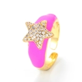Adjustable gold star ring with pink enamel and sparkling crystals on white background - Adjustable Open / Rose Red