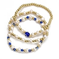Detailed view of 3-piece blue evil eye beaded bracelet set with gold beads and white pearls - Layered Artificial Pearl Blue Gold Style (BE843MI05)
