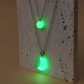 Ensemble de colliers phosphorescents avec pendentifs ronds et croissants sur pierre - Green Glow Moon and Round Pendant Set