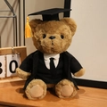 Brown teddy bear plush in graduation gown and cap with yellow tassel for graduation gift - Black Tie Suit Style