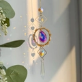 Rainbow prism crystal suncatcher reflecting vibrant colors on a white wall - Yellow Aventurine Circle
