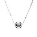 Close-up of a black and white volleyball pendant on a polished silver chain necklace - Volleyball Stainless Steel Necklace
