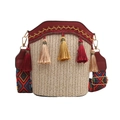 Detail of woven straw bag with tassels, red PU leather trim and geometric pattern strap - One Size / Red