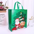 Green non-woven Christmas gift bag featuring Santa Claus and Feliz Navidad greeting - 35*38*14cm / Christmas Green (Large)