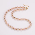 Macro di perle di quarzo rosa e distanziatori in metallo dorato con chiusura a moschettone - Collana / Collana Oro