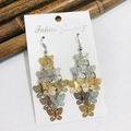 Elegant multi-color hollow butterfly tassel earrings on a display card for women - Two-tone Butterfly