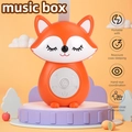 Portable orange fox baby sleep sound machine with silicone strap and music controls - Fox / Orange