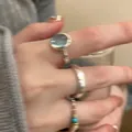 Silbernes Schleifen-Ring-Set mit blauem Zirkon und Türkisperlen an der Hand - Silber Blau Edelstein Stil (J877)