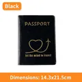 Faux leather passport holder in black with gold heart pattern and plane design - Black