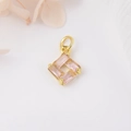 Macro view of gold plated square pendant with four baguette-cut pink zircon stones for DIY - Pink