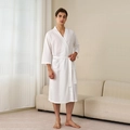 Men's white waffle weave bathrobe with waist tie and pocket in a cozy home setting - White (Men)
