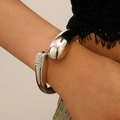 Silver hammered bangle with irregular open design and pavé rhinestones in polished finish - Water Drop + Rhinestone Open Bangle (A-823) / Bright Silver