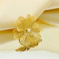 Exquisite gold floral petal ring with white pearl on silk background and mirror reflection - Adjustable Open / Filigree Hollow Pearl Flower Style (KR113265-SP)