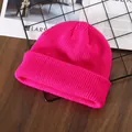 Unisex ribbed knit beanie hat in vibrant rose red color for winter outdoor warmth - Rose Red