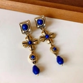 Detailed macro view of vintage gold drop earrings with blue stone inlay and cubic zirconia - 6# Gold Blue Long Dangle (Silver Earring Post)