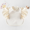 Waterproof cream baby bib with delicate wing-shaped ruffle lace and food catcher pocket - Wings - Milky White Wings / One Size