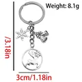 Silver Christmas keychain with deer pendant, snowflake and bells in 8.1cm length - ER1802-Antique Silver Bell Reindeer Snowflake Keychain