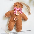 Handmade brown wool felt gingerbread man ornament with red bow and wooden buttons - Gingerbread Man / 9x11.5cm / Brown