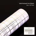 Minimalist white gift wrapping paper with gold and black crisscross pattern, 50x70cm size - White with Gold Grid
