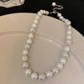 Silver textured beads and white pearls necklace with extension chain on beige plate - Silver Round Bead Pearl Necklace (25#)