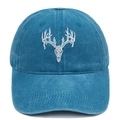 Close-up of a washed blue cotton baseball cap featuring white elk skull embroidery - Lake Blue