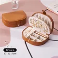 Portable brown PU leather jewelry organizer with secure button closure for travel - Brown