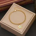 Golden chain bracelet with star pendant featuring blue evil eye charm on beige box - Star Evil Eye Style (3#)