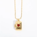 Golden rectangular locket pendant with a red heart gem and twisted rope chain detail - Striped Gold Red Heart Locket / Gold