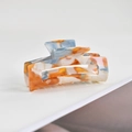 Grande pince à cheveux en acrylique avec motif marbré bleu et orange élégant et chic. - Pince Acétate 131