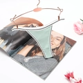 Mint green ribbed cotton T-back thong for women displayed on a rose gold hanger - Bean Green