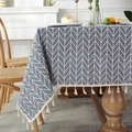 Close-up of grey cotton linen tablecloth with white arrow pattern and decorative tassels - Diameter 150cm (Round) / Grey Arrow with Beige Tassels