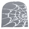Detailed close-up of white spider web jacquard pattern on a grey knit beanie hat - One Size / Off-White