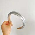 Detailed view of silver wide headband with metallic finish and soft beige lining padding - Silver