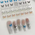 Detail of butterfly nail art stickers with gold foil and gradient blue wing designs - YO-024 Garden Butterfly