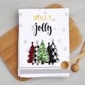 Christmas kitchen towel with plaid Christmas trees and Holly Jolly text on wood board - Three Christmas Trees