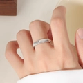 Detailed close-up of a silver titanium steel ring featuring fine vertical ripple textures - US 5 / Silver