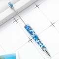 Blue and orange camouflage beaded pen with silver metal accents on a white grid background - Blue Camouflage Dual-Use Pen (57)
