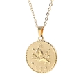 Detailed view of the golden Leo zodiac pendant with relief lion design and LEO engraving - Leo