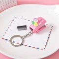 Pink mini stapler keychain with colorful smiling flower charm and matching staples - Colorful Flower