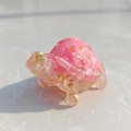 Miniature crystal turtle ornament with pink quartz and gold foil inside a clear resin shell - 48 Dark Rose Quartz + Gold Foil