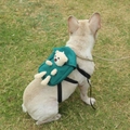 Dark green pet backpack featuring a plush bear doll on a French Bulldog's back - Bear / Green