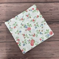 Floral printed paper napkins with vintage red and blue blossoms on a wooden surface - Fresh Small Floral
