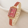 Elegant gold square watch with red rhinestone dial and luxurious bracelet strap - Red